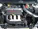 1996 Ford Probe - The engine bay of a Dodge Neon SRT-4, its turbocharged engine and custom intake.