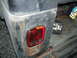 1989 Jeep YJ - Rear corner of a 1989 Jeep YJ with taillight removed and body damage visible.