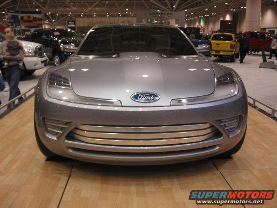 Silver concept car with a prominent Ford logo and a multi-slat grille