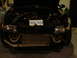 1981 Ford Mustang - This modified black car displays its twin turbo engine setup with an Ontario license plate.