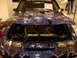 1981 Ford Mustang - This 1981 Ford Mustang features a striking custom airbrushed design with skulls and flames on the hood and front end.