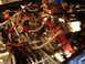 1981 Ford Mustang - Close-up view of an engine bay custom wiring and plumbing.