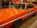1981 Ford Mustang - This iconic muscle car, a 1969 Dodge Charger, is displayed indoors with "01" graphics on its doors and roof.