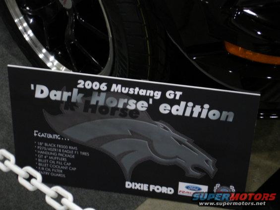 Sign for 2006 Mustang GT Dark Horse edition, listing features like 18-inch black rims and Eagle F1 tires