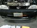 1981 Ford Mustang - Front view of a black car with an open hood, engine details, a running horse emblem, and a custom license plate.