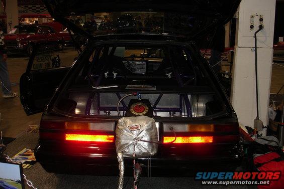 hatchback rear with fuel cell and roll cage visible inside