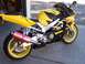 2000 Honda CBR-RR - Yellow and black 2000 Honda CBR-RR motorcycle parked outdoors.