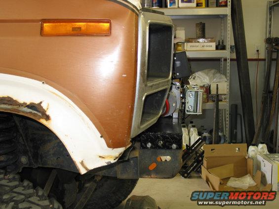 1981 Ford Bronco front fender with rust and aftermarket bumper with winch mount