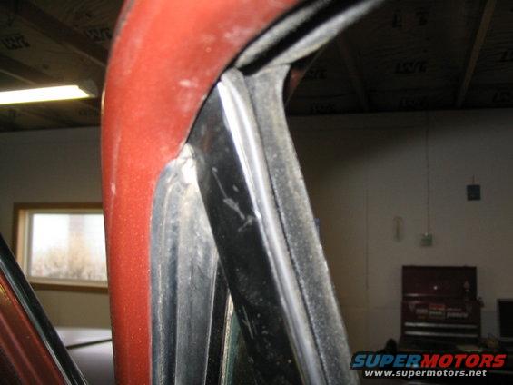 Red door frame and window seal detail