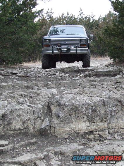 1986 Ford Bronco on rocky terrain