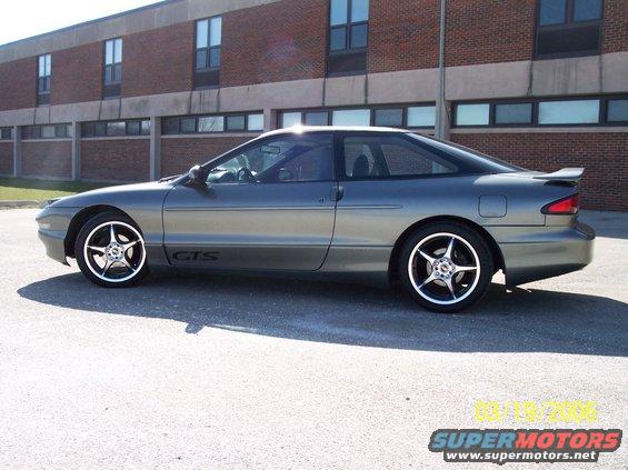 1995 Ford Probe GTS coupe, side view, aftermarket wheels