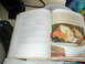 1979 Ford Bronco - Cookbook open to a recipe for twice-baked potatoes, with a picture of the finished dish.
