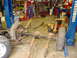 1983 Ford F-250 - Rear axle and suspension components are laid out in a workshop setting that appears to be a workshop or garage.