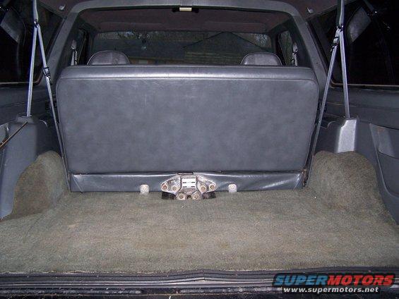 Interior cargo area of a 1992 Ford Bronco with folded rear seat