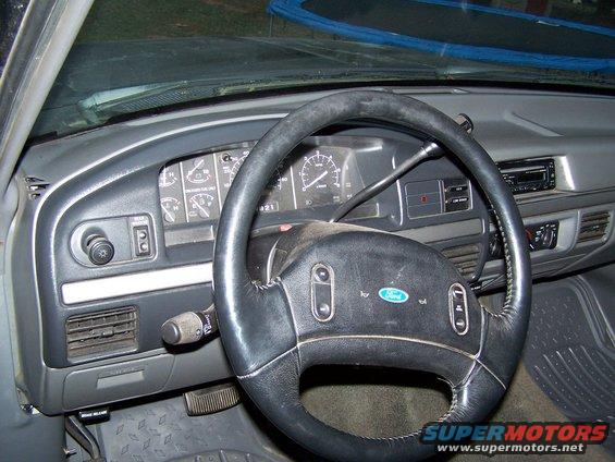1992 Ford Bronco interior showing dashboard, steering wheel, and radio
