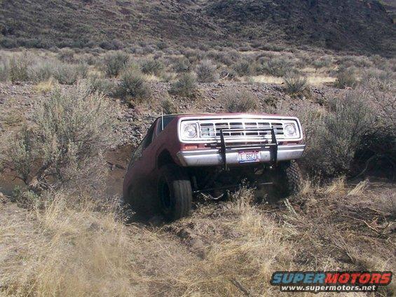 Red 1978 Dodge Ramcharger off-roading
