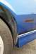 1990 Chevrolet Camaro - This blue car shows rust in the wheel well and a side marker light on the fender.