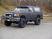 1995 Ford Mustang - This lifted Ford Bronco is equipped with off-road tires and a front push bar.