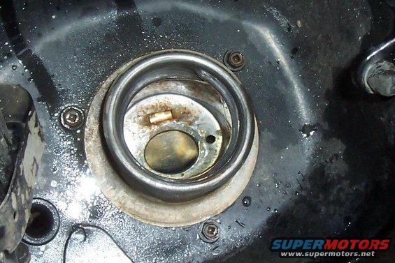 Close-up of a vehicle's fuel filler neck opening