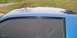 1990 Chevrolet Camaro - A close-up view of a blue car's roof and window shows a reflection of a tree. Text from "SUPERMOTORS" is visible on the lower right.