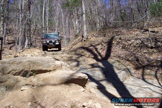 Steve in one of the Landrovers preparing to punish some rocks.
