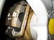 1996 Ford Probe - A close-up view of a vehicle's brake caliper and rotor, showing signs of rust.
