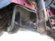 1995 Ford Thunderbird - A close-up view of the underside of a vehicle, focusing on suspension and steering components.