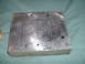 1978 Ford Bronco - Throttlebody adapter plate being marked up for machine work.