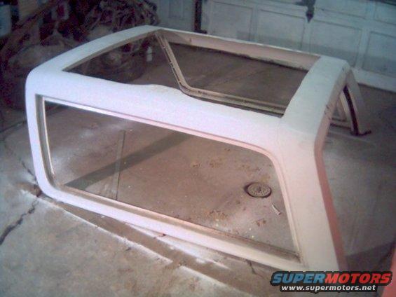 Vinyl windows will also be placed inside the stock window locations attached with snaps.