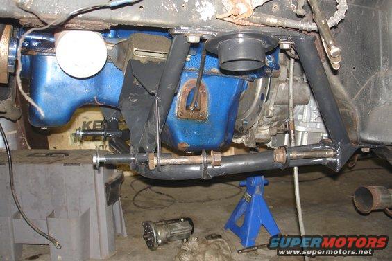 1981 Ford Mustang engine bay with blue oil pan and suspension components