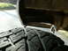 1991 Ford Bronco - Underside view of a vehicle, showing the tire and frame components.