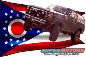 Ford Bronco, looks like early 80s, in front of Ohio flag