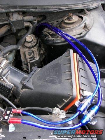Audio System Installation - Power Wires for both amplifiers passed through factory firewall opening just below steering column
