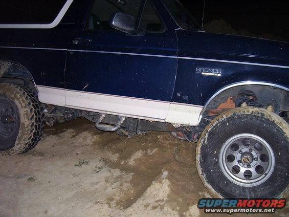 1992 Ford Bronco side view, stuck in mud