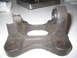 1990 Ford Bronco - This close-up shows a worn metal part with a bearing, likely a component from a vehicle's drivetrain.