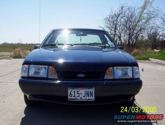 Dark blue 1991 Ford Mustang coupe with a Texas license plate