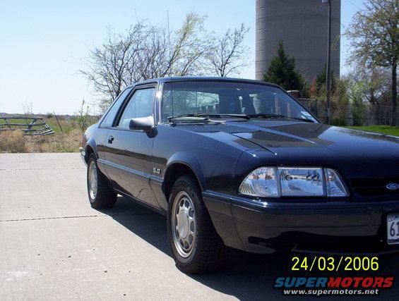 Dark blue 1991 Ford Mustang coupe with 5.0 badge