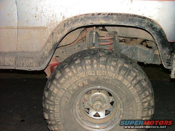 dscf1571.jpg See how far the tire sits back in the wheel well... it should be centered.  It took a pretty good hit on this side to do it.