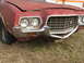1972 Ford Ranchero - Front view of a 1972 Ford Ranchero showing its grille and damaged bumper.