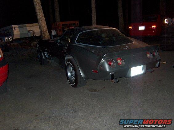 Rear view of a 1979 Chevrolet Corvette parked at night