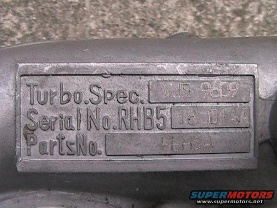 Turbocharger identification plate with Turbo.Spec., Serial No.RHB5, PartsNo. and numbers VJS 9609, 13 D1AA, FEH3A