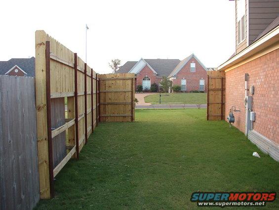 16.jpg It's actually bigger than it looks here.  If I really wanted to, I could probably get 3 Broncos in here.  The gates are both 12' wide, so I can pull anything thru to the back yard easily.