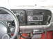 1996 Dodge 2500 - Dashboard of a 1996 Dodge 2500, an aftermarket radio and CB unit.