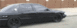 1995 Chevrolet Impala - This black 1995 Chevrolet Impala sedan is seen from the side.