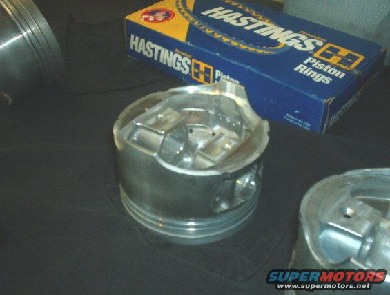 Pistons and Hastings piston rings box