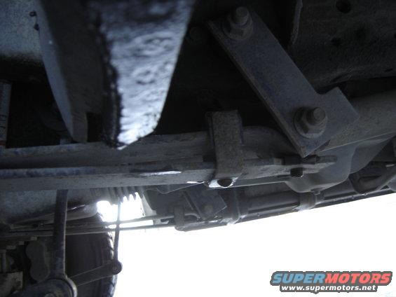 Underside view of leaf spring and suspension hardware
