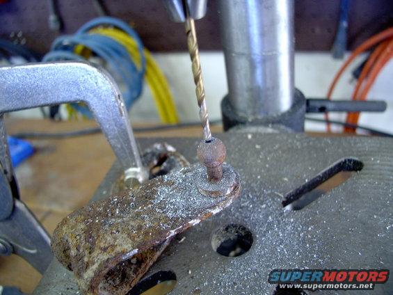 img_0201.jpg Started drilling out the ball. Went all the way out to 1/4 UNC-20 so only the ball is left with internal threads to allow spinning it onto the 1/4" stud.