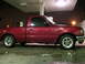 1994 Ford Ranger - Red Ford Ranger pickup truck parked under a covered area at night.