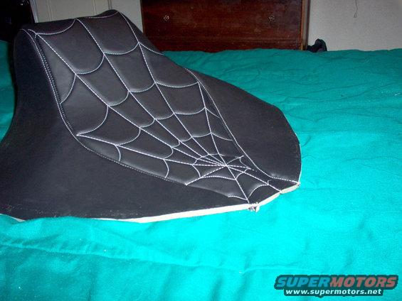 Harley Soft-tail seat
black vinyl with custom spider web stiching
single reinforced outer seam