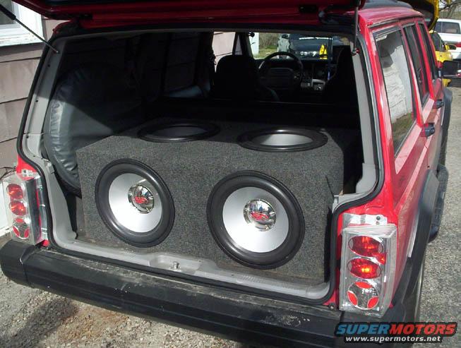 custom sealed box
2 chambers, 2 subs in each chamber
4 - 15" Rockford HE2 subs